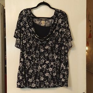 Blue flowered blouse by Covington woman